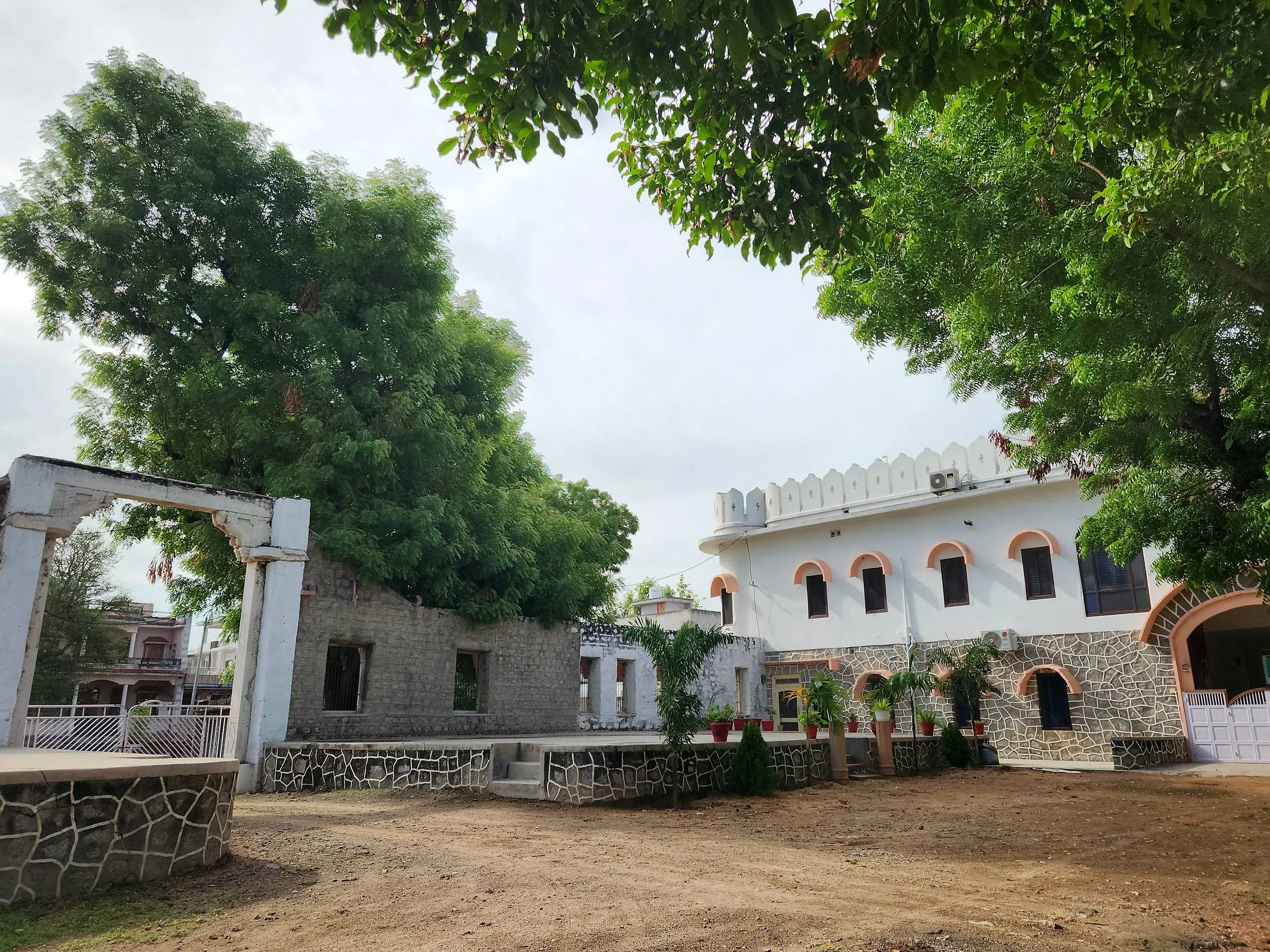 The last stretch of the village track to Rawla Bankli, the white house waiting at the end between old trees